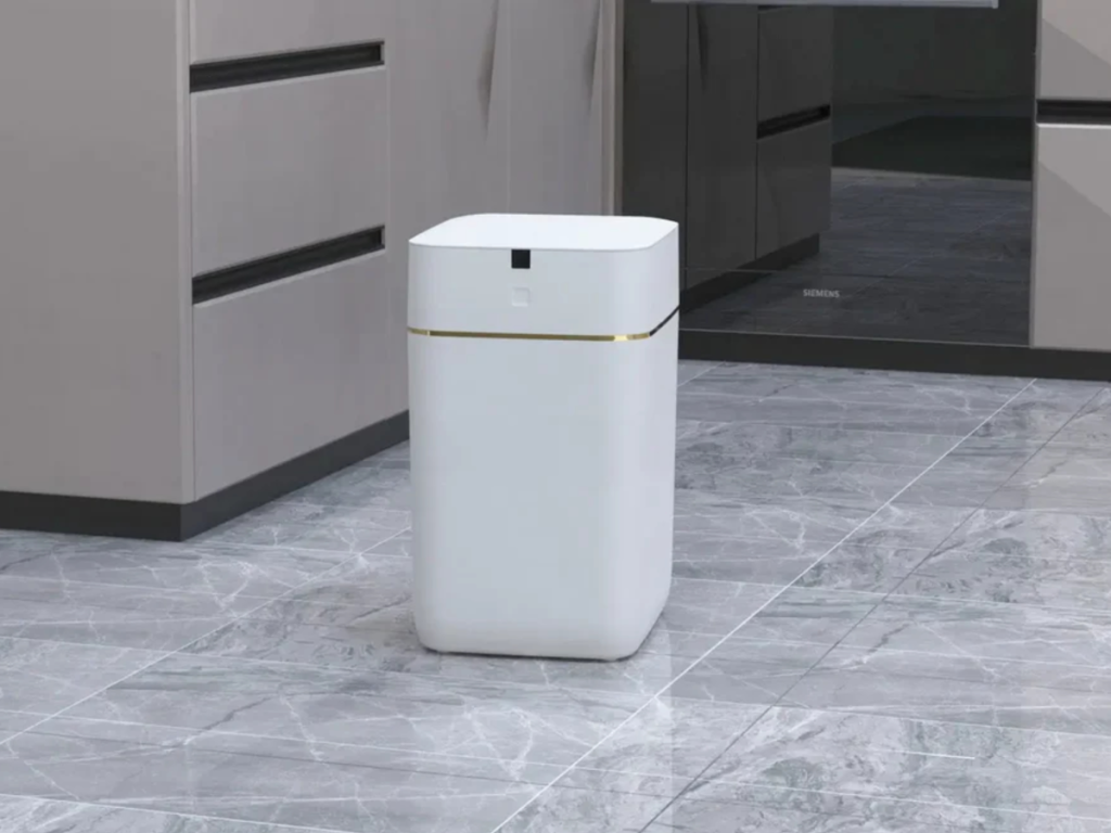 self changing automatic trash bin